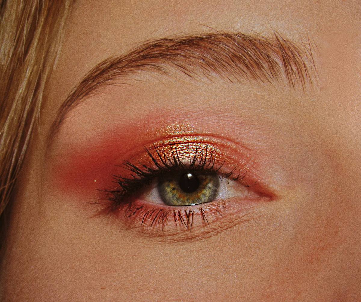 makeup by mario social media coordinator analyzing engagement metrics on laptop